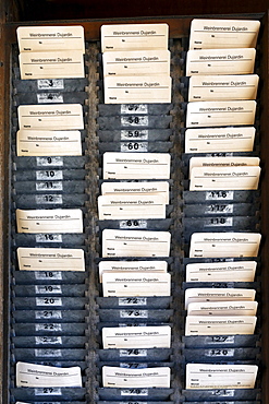 Board with time-stamped cards, time-punch machine, former Dujardin distillery, Krefeld-Uerdingen, North Rhine-Westphalia, Germany, Europe