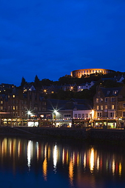 Oban with the promenade and McCaig's Tower at night, Argyll, Scotland, United Kingdom, Europe