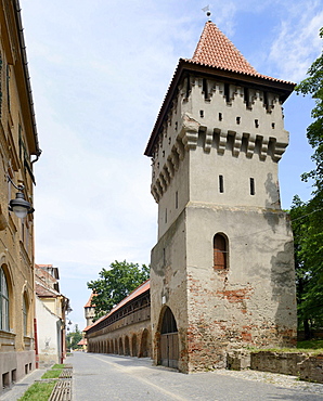 Defensive wall with tower in Strada Cetatii, Sibiu, Romania, Europe