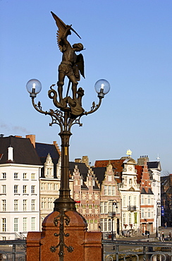 Dragonslayer, sculpture on the Sint Michielsbrug, houses on the river Lys, old town, Ghent, East Flanders, Belgium, Europe