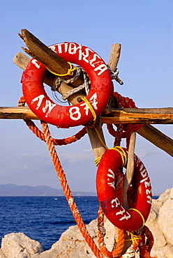 Life savers on a rack, port of Hydra, Hydra island, Greece, Europe