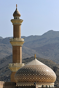 View from the fort on the minaret and dome of the mosque in Nizwa, Oman, Middle East