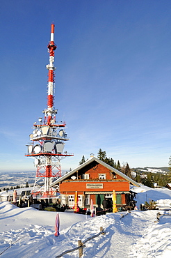 The 95 meter high transmission mast of the broadcaster ORF on the 1064 meter high Pfaender Peak with the guest house Pfaenderspitze, Vorarlberg, Austria, Europe