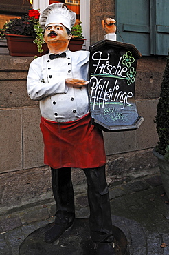 Chef figure with menue board standing in front of a restaurant, Abenberg, Middle Franconia, Bavaria, Germany, Europe