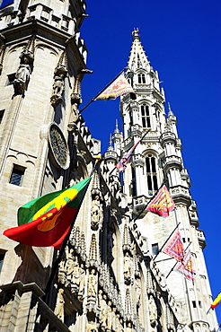 Town Hall with traditional flags and a Gothic style tower, Hotel de Ville on Grand Place or Stadhuis on Grote Markt square, city centre, Brussels, Belgium, Benelux, Europe