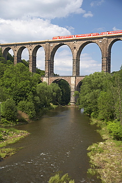 Viaduct Goehren with regional train, bridge over the Zwickauer Mulde river in Rochlitz, Saxony, Germany, Europe