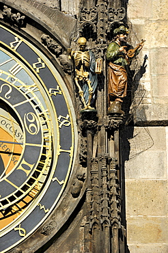 Allegorical statues representing death and paganism on the Prague Astronomical Clock on the clock tower of the Old Town City Hall, Old Town Square, historic district, Prague, Bohemia, Czech Republic, Europe