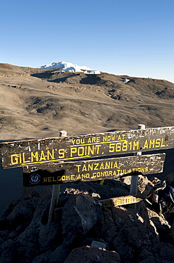 Trekking, mountain climbing, sign at the summit of Gilman's Point, stepped glacier on the crater rim, Kilimanjaro, Marangu Route, Tanzania, East Africa, Africa