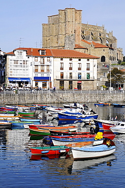 Small boats in a harbour, Santa Maria Church, Castro Urdiales, Gulf of Biscay, Cantabria, Spain, Europe