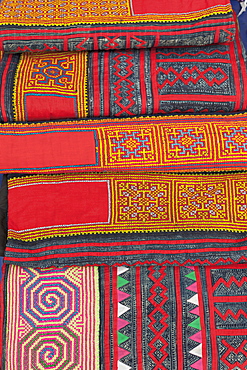 Colourful textiles on sale at the night market in Luang Prabang, Laos, Southeast Asia