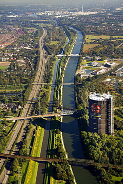 Aerial view, Rhine?Herne Canal with gasometer, Emscher river, Neue Mitte, Oberhausen, Ruhrgebiet region, North Rhine-Westphalia, Germany, Europe