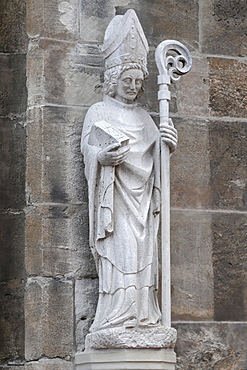 Statue of a saint at the entrance of Holy Cross Minster Cathedral, Schwaebisch Gmuend, Baden-Wuerttemberg, Germany, Europe