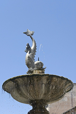 Detail with upper basin and dolphin of one of the two fountains by Giovanni Jecini, with sculptures by Giorgio Paci, 1882, in Piazza Arringo, Ascoli Piceno, Marches, Italy, Europe