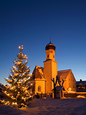 Wintry church with Christmas lighting near Wallgau, Upper Bavaria, Bavaria, Germany, Europe