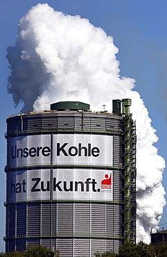 Gas holder, Kokerei Prosper coking plant with a large poster of the IGBCE trades union with a lettering "Unsere Kohle hat Zukunft", German for "Our coal industry has a future", protest against the closure of coal plants in Germany and the reduction of sub