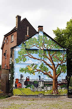 Old house about to be demolished, wall painted with a tree in an industrial landscape, Bruckhausen district, Duisburg, North Rhine-Westphalia, Germany, Europe