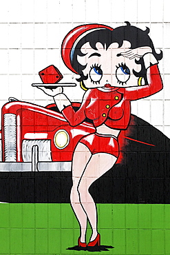 Waitress with saucer eyes, comic-style advertising character painted on the wall, drive-in restaurant, Krefeld, North Rhine-Westphalia, Germany, Europe