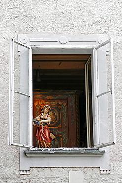 Antique shop window with statue, historic centre of Salzburg, Austria, Europe