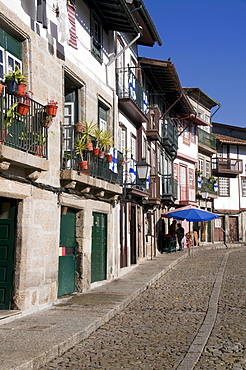 Houses in a street of the historic district of Guimaraes, Portugal, Europe