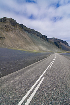 Country road leading into wilderness, Eastern Coast, Iceland, Europe