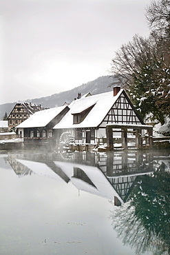 Mill reflected in the Blautopf spring, Blaubeuren, Swabian Alb, Baden-Wuerttemberg, Germany, Europe