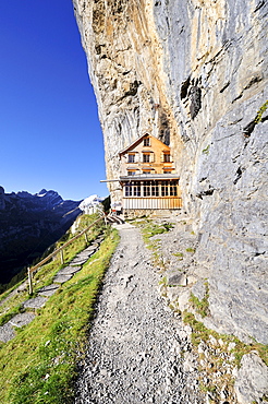 The Aescher mountain restaurant near the Wildkirchli caves below the Ebenalp cliff, Canton Appenzell Inner Rhodes, Switzerland, Europe