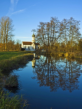 St. John's Church reflected in the Schmutter River, Dietkirch near Gessertshausen, Swabia, Bavaria, Germany, Europe