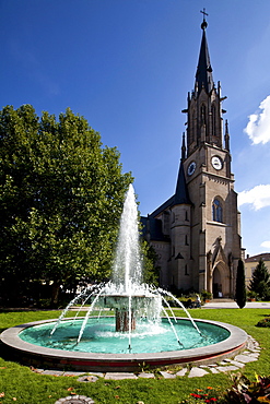 Fountain and Herz-Jesu-Kirche church, Bad Kissingen, Lower Franconia, Bavaria, Germany, Europe