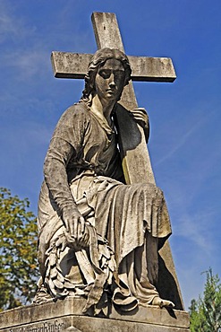 Statue of a woman carrying a cross on a 19th century family grave, Johannisfriedhof cemetery, founded in the 13th century, Brueckenstrasse street 9, Nuremberg, Middle Franconia, Bavaria, Germany, Europe