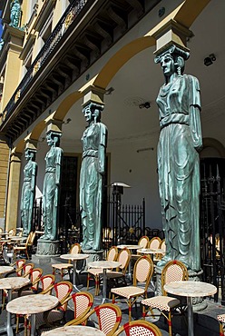 Detail of a facade with figures supporting the building, street cafe, terrace bar, Winkel van Sinkel restaurant, former department store in the old city centre near Oudegracht, Utrecht, Holland, Netherlands, Europe