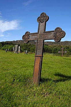 Cross on a grave, cemetery in Iceland, Europe