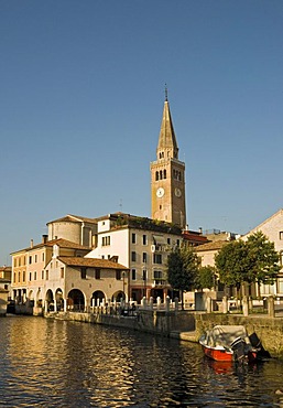 Historic district with leaning cathedral tower, Campanile pendente, and Lemene river, Portogruaro, Veneto, Italy, Europe