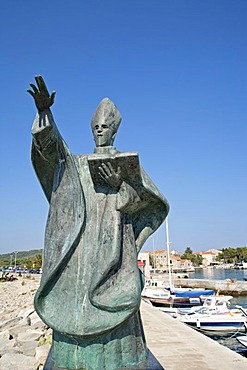 Statue of St Nicholas in the harbour of Sucuraj, island of Hvar, Adriatic Coast, Croatia, Europe