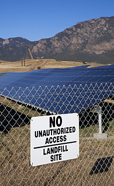 A solar photovoltaic facility, built on top of a former landfill at the U.S. Army's Fort Carson uses contaminated land to generate renewable energy and generates 3, 200 megawatt-hours of power every year, Colorado Springs, Colorado, USA