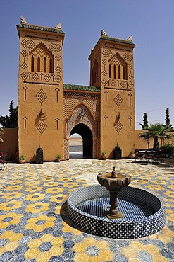 Kasbah-styled building with traditional ornaments and patterns of the Berbers, with courtyard and fountain, Hotel Kasbah Asmaa, Morocco, Africa