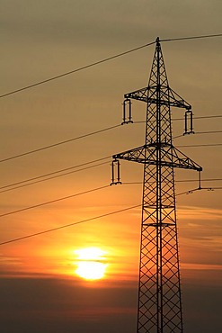 Electricity pylon at sunrise