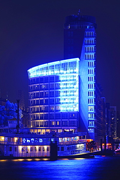 Blue illuminated building of the HTC Hanseatic Trade Center, at the Kehrwiederspitze at the Cruise Days 2010, "Blue Port" art project by the artist Michael Batz, Hafencity district, Hamburg, Germany, Europe