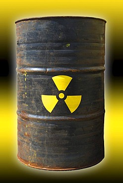 Rusty barrel with a radiation warning symbol