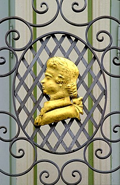 Mozart's head on a balcony railing, Carlsbad or Karlovy Vary, Czech Republic, Europe