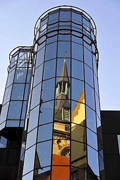 South tower of the Stiftskirche church and Fruchtkasten building reflected in modern glass front of a new building, Stuttgart, Baden-Wuerttemberg, Germany, Europe