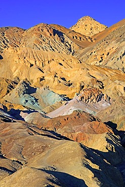 Rock colours caused by the oxidation of different metals, Artist's Palette at dusk, Death Valley National Park, California, USA, North America