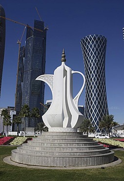 Innovative modern architecture, coffee pot sculpture on a roundabout in front of construction sites in the city, to the right, the 200m and 52 floors high QIPCO Holding Tornado Tower, West Bay District, Doha, Qatar, Middle East