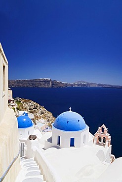 View from Oia across the caldera to Fira, Oia, Santorini, Cyclades, Greece, Europe