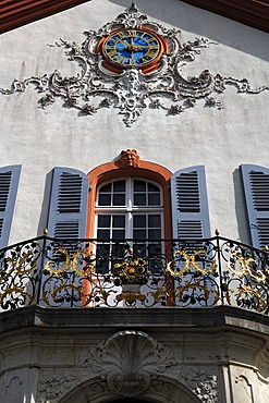 Facade at the entrance, detailed view of Castle Buergeln with clock and balcony, built by Franz Anton Bagnato in 1762, early Classicism style, Schliengen, Baden-Wuerttemberg, Germany, Europe