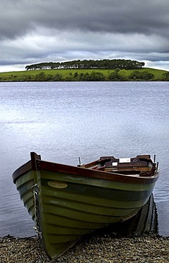 Wooden dinghy on Billberry Lake, County Mayo, Republic of Ireland, Europe