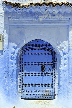 Blue front door with a door knocker, Chefchaouen, Rif Mountains, Northern Morocco, Morocco, Africa