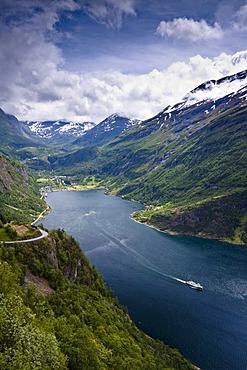 View of the Geiranger Fjord from the eagle eyes view ornesvingen with the town of Geiranger and the ferry to Hellesylt, Norway, Scandinavia, Europe