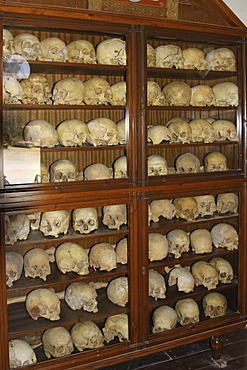 Martyrs' skulls and bones, ossuary, former windmill, Arkadi Monastery, Moni Arkadi, National Monument, Crete, Greece, Europe