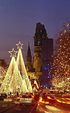 Tauentzienstrasse strasse and Kaiser-Wilhelm-Gedaechtniskirche, Kaiser Wilhelm Memorial Church at Breitscheidplatz square at Christmas time with fairy lights, Charlottenburg district, Berlin, Germany, Europe