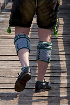 Man with Lederhose leather trousers and calf warmers, Bavarian Haferlschuhe shoes, Bavarian, tradition, traditional costume, legs, Bavaria, Germany, Europe